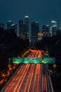 View of the downtown Los Angeles skyline and 110 Freeway at night, from Elysian Park in Los Angeles, California Royalty Free Stock Photo