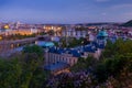 View on downtown Prague bridges and river from romantic Letna view point during early sunset with yellow street lights Royalty Free Stock Photo