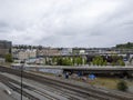 Seattle, WA USA - circa May 2021: View of downtown Seattle on an overcast day, with homeless tents and shelters in sight beneath