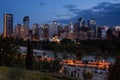 Calgary downtown skyline at night across the river in Alberta, Canada Royalty Free Stock Photo