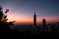 View of downtown in Taipei at the sunset time with Taipei 101 Skyscraper. Royalty Free Stock Photo