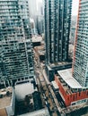 View on downtown Toronto city in Canada, Ontario from top above roof. Aerial urban view from high. Busy urban city street. Urban