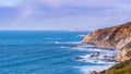 View of the dramatic Pacific Ocean coastline, with rocky cliffs, on a sunny day, Point Reyes National Seashore, California