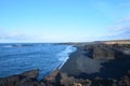 View of Dritvik Black Sand Beach with Black Lava Rock