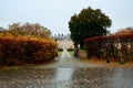 View of a driveway and gated entrance of old residential buildings Royalty Free Stock Photo