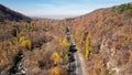 Drone view of the autumn road and shadows. Royalty Free Stock Photo