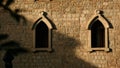 The view from the drone. Creative. A beautiful brick architectural building with green vegetation nearby and open dark Royalty Free Stock Photo