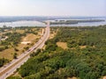 View from the drone to the highway, forest, river with islands and bridge Royalty Free Stock Photo