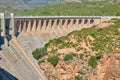 View of the dry spillway of a concrete dam during a long drought