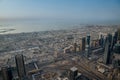 View of Dubai from above from the observation deck of the Burj Khalifa skyscraper on Sheikh Zayed Highway, Persian Gulf in the Royalty Free Stock Photo