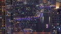View of Dubai Marina showing canal surrounded by skyscrapers along shoreline night timelapse. DUBAI, UAE Royalty Free Stock Photo