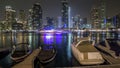 View of Dubai Marina towers and yahct in Dubai at night timelapse hyperlapse Royalty Free Stock Photo