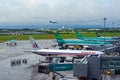 View of Dublin airport apron, with 5 airplanes prepared for departure, from passenger terminal.