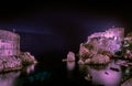 View of Dubrovnik - Fortresses Lovrijenac (right side) and Bokar at night. Royalty Free Stock Photo