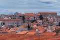 View of Dubrovnik old town buildings and red roofs from the city wall Royalty Free Stock Photo