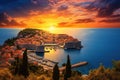 View of Dubrovnik old town and harbor at sunset, Croatia, Dubrovnik, Croatia, Beautiful romantic old town of Dubrovnik during