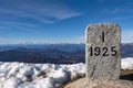 View of Dufourspitze mountain from Mount Generoso with a boarder milestone Royalty Free Stock Photo