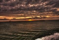 View of Dunkirk industrial port from the ferry at sunset.