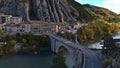 View of Durance river in village Sisteron, Provence, France in autumn season with famous bridge Pont de la Baume.