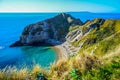 View of Durdle Door, a natural limestone arch on the Jurassic Coast near Lulworth in Dorset, England, UK Royalty Free Stock Photo