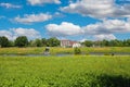 View from dutch border over green agriculture fields, Maas river, on belgian riverside restaurant - Ophoven, Belgium and Ohe en