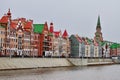 A view of the Dutch-style Embankment of Bruges from the other side of the river. Russia Yoshkar-Ola 01.05.2021