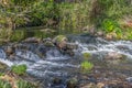 View of DÃÆo river, with trees, rocks and vegetation on the banks, reflections in the water and bright colors Royalty Free Stock Photo