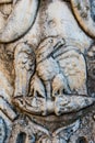 View of eagle sculpture carved on the walls of the famous Roman ruins in Timgad, Algeria