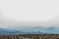 View of Eastern Sierra Nevada mountains shrouded in smoke of California forest fire Royalty Free Stock Photo