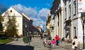 View of Eger streets with walking people in sunny autumn day