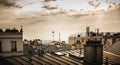 View of the Eiffel Tower above the rooftops of Paris Royalty Free Stock Photo