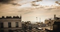 View of the Eiffel Tower above the rooftops of Paris Royalty Free Stock Photo