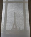 View on Eiffel tower through the curtains, Paris, France. Paris cityscape Royalty Free Stock Photo