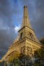 View on Eiffel tower, dark clouds and sunshine, Paris Royalty Free Stock Photo