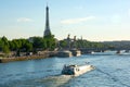 View of the Eiffel Tower, Pont Alexandre III and the Seine river in summer Royalty Free Stock Photo