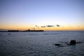 View of El Castillo de San Sebastian at sunset on the beach of La Caleta in the bay of the capital of Cadiz, Andalusia. Spain. Royalty Free Stock Photo