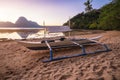 View of El Nido bay with local banca boat in front at low tide, picturesque scenery in the afternoon, Palawan Royalty Free Stock Photo