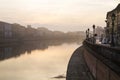 View on embankment of Arno river at sunrise in Pisa