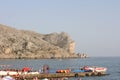 View of the embankment of the city of Sudak from a height.