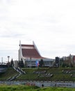 View of the embankment of the Om river and the musical theater in the historical center of Omsk in summer