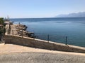 View from the embankment to the sea and mountains. Gagra, Abkhazia Royalty Free Stock Photo