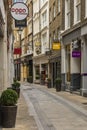 View of empty Bow Lane with restaurants and stores, part of richly historic Bow Lane Conservation Area in London England Royalty Free Stock Photo