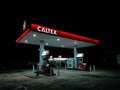 View of the empty Caltex gas station with equipment at night