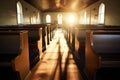 view of empty church pews in soft morning light