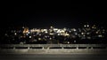 View from empty concrete bridge above the town at night Royalty Free Stock Photo