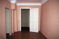View of an empty hallway with an open door Royalty Free Stock Photo