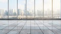 A view from an empty marbled floor towards a city skyline through large windows. Royalty Free Stock Photo