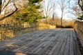 Wooden Footbridge in a Park on a Sunny Winter Morning Royalty Free Stock Photo