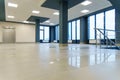 View of an empty spacious hall with columns and panoramic windows. Modern interior design of an empty office. A room with large Royalty Free Stock Photo