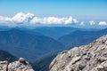 View of endless mountain ranges in the haze of the day